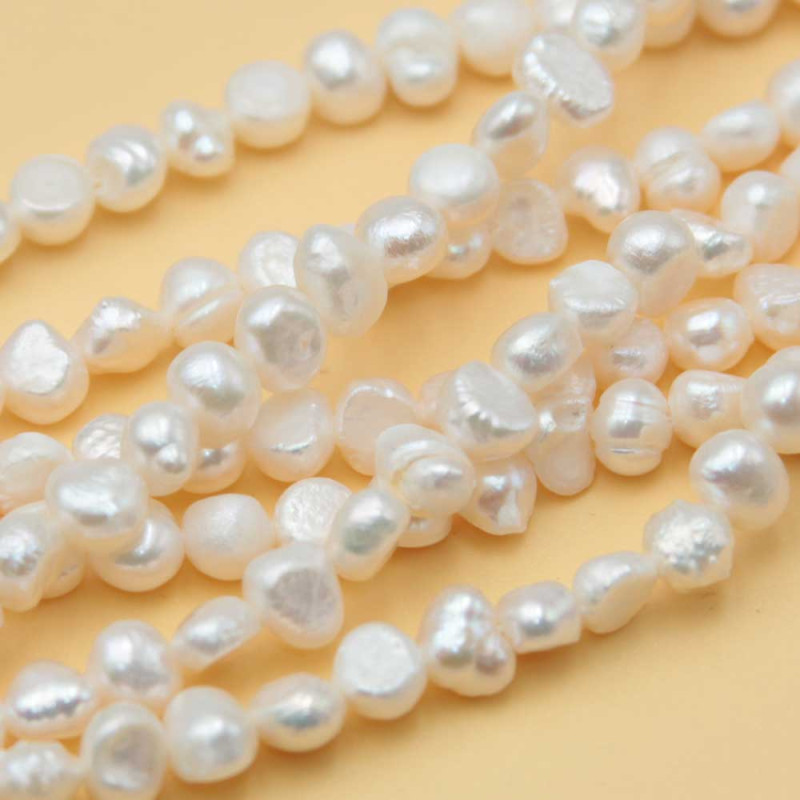 Perle di fiume bianche 6 mm irregolari AAAA Quality filo 35 cm - 6-mm-perle - Bijouxfaidate.it Perle di fiume bianche 6 mm irregolari AAAA Quality filo 35 cm (6-mm-perle) - Bijouxfaidate.it